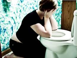 image showing a woman feeling disappointed by herself after purging