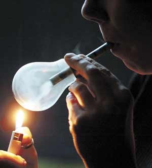 image showing a woman smoking crack